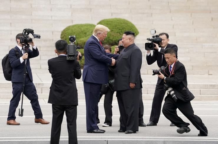 Then-U.S. President Donald Trump meets with North Korean leader Kim Jong-un at the demilitarized zone separating the two Koreas, in Panmunjom, South Korea, June 30, 2019. Reuters-Yonhap